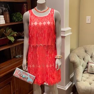 Orange and cream lace dress.